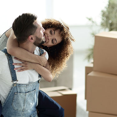 Happy Couple Moving In